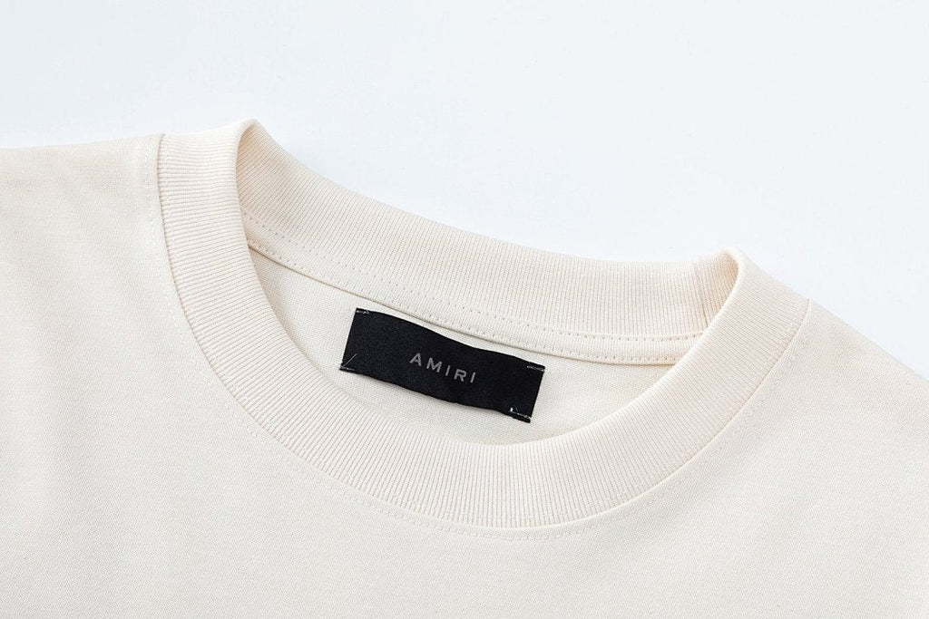 AMIRI graphic logo-print T-shirt